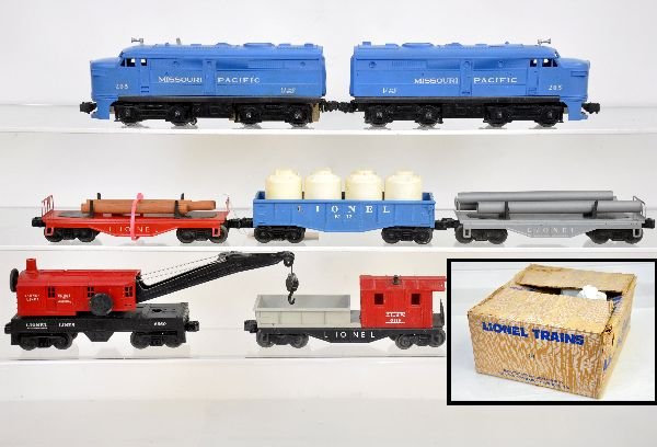 Boxed Lionel Freight Set 728: Sears version of set 1575. Includes 205 MP Alco AA diesels, both have hairline cowl cracks with metal supports; 6111 log flat; 6112 gondola with canisters; 6560 crane; 6121 pipe flat, 1 pipe cracked; 