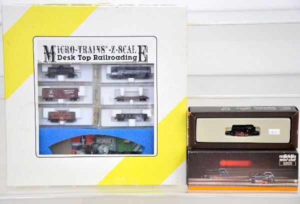 Micro Trains & Marklin Z Gauge Lot: Includes a Marklin 8805 steam switcher; Micro Trains 6 Pc NYC Diesel freight set with trains only. Both appear test run and have boxes, C8