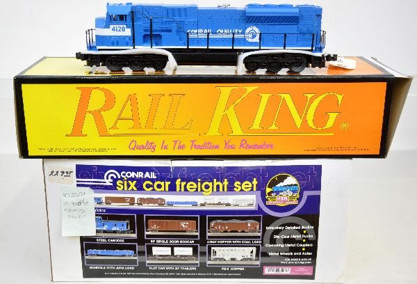 MTH Conrail Diesel Freight Set: Includes a RailKing 30-2120-0 SD-90 Mac diesel with whistle; premier 20-90009 freight assortment, missing the trailer flat. All appears lightly run with boxes, C8+. Some boxes in this lot may have lig