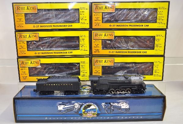 7Pc MTH RailKing PRR Steam Passenger Set: Includes 20-800021 Turbine with ProtoSounds; Heavyweight cars include 30-6236B, C, D & E; 2 #30-6237 coaches. All show light runtime with boxes, C8+. Some boxes in this lot may have light to moderate 
