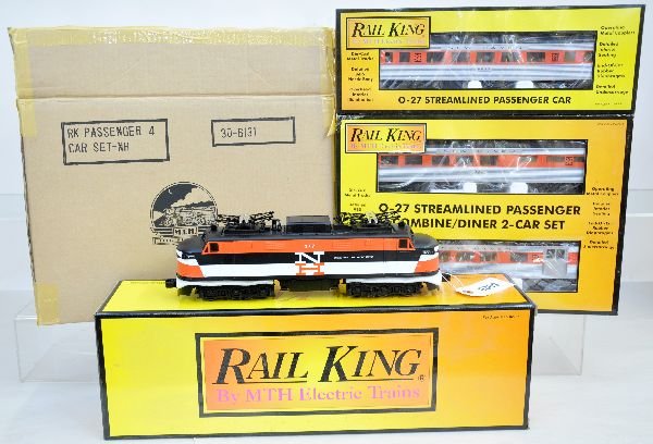 MTH RailKing NH Passenger Set: Includes 30-2170-1 EP-5 with ProtoSounds; Streamline cars include 30-6131 4-pk; 30-6137 combine/diner set. All appear unrun with boxes, C9. Some boxes in this lot may have light to moderate basement s