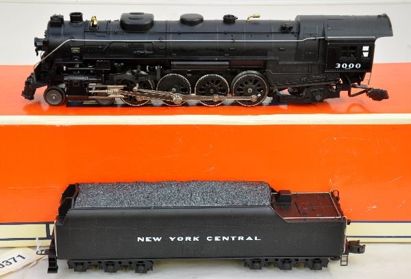 Lionel 18009 NYC Mohawk Steam Loco: 042. Nice L-3 4-8-2 featuring light, smoking stack & chests, RailSounds, Firebox glow and more. It shows runtime with worn box, but body appears C8. Box in this lot may have light to moderate basement