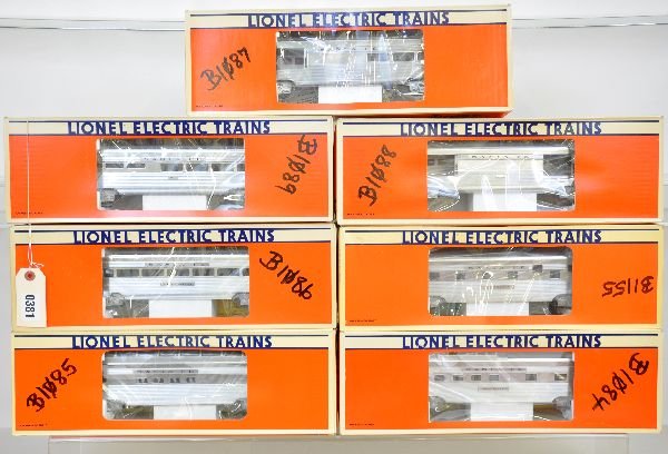 7 Lionel SF Aluminum Passenger Cars: 19109 baggage, 1/2" rust spot on frame; 19110 combine; 19138 roomette; 19112 coach, 2 small rust spots on frame; 19111 diner; 19128 full vista-dome, 2 frame grommets show oxidation; 19113 observation.