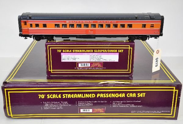 MTH SP Daylight Passenger Cars: 042. Includes 20-6529 70 ft 5-car ABS set with the 20-6623 sleeper/diner set. Cars are unrun, boxes show some wear, C9 (see Lot 346 for extension cars). Some boxes in this lot may have light to modera