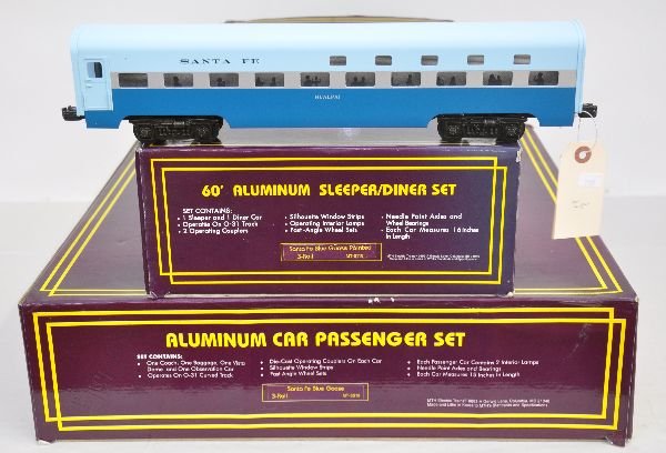 MTH SF Blue Goose Passenger Cars: 60' smooth side cars include 6018 4-car set with 20-6118 sleeper/diner set. They appear unrun with light graffiti on set boxes & inserts, C9. Some boxes in this lot may have light to moderate basement