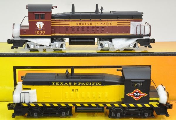 2 MTH RailKing Diesel Switchers: Includes 30-2178-1 T&P SW8 diesel & 30-2179-1 B&M SW-9. Both have dual motors & ProtoSounds with squeaking brakes & freight yard sounds. They show light runtime with boxes, C8. Some boxes in this lot 