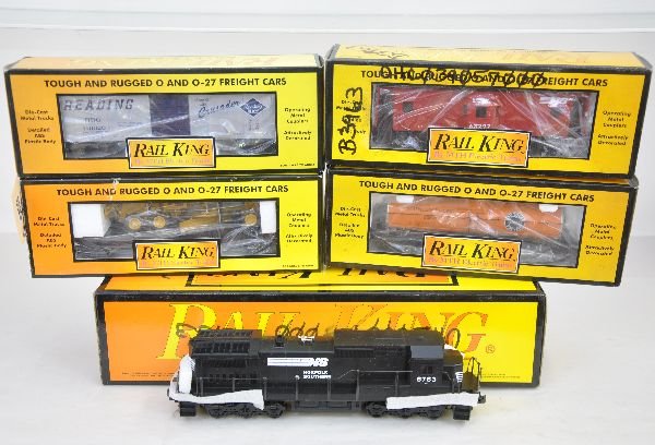 5 Pc MTH RailKing N&S Freight Set: Includes 30-2114-0 Dash-8 diesel with whistle; 30-7673 flat with grader; 7438 boxcar; 7313 tank car; 7711 caboose. All show light to moderate runtime with boxes, 2 have graffiti, C7+-9. Some boxes in 