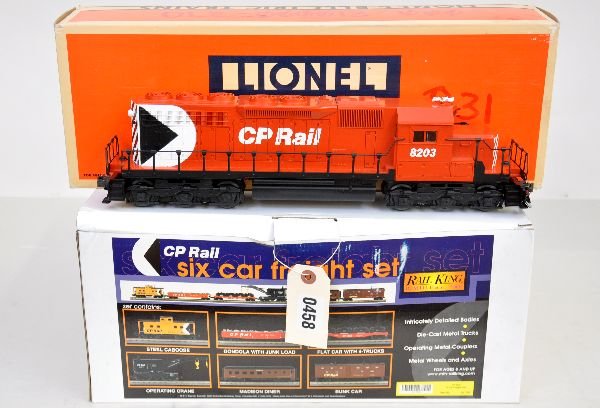 Lionel MTH CP Rail Freight Set: Lionel 18203 SD-40 diesel with dual motors, light & horn, lightly run; MTH RailKing 30-7009 6-car assortment with wheel flat, gondola; bunk car; Madison Diner, Crane & caboose. Cars appear unrun, all 