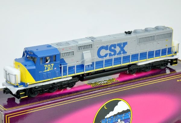 MTH 20-2224-1 CSX SD70MAC Diesel: Features include dual motors with illuminated cab; ProtoCouplers & Reveres, ProtoSounds with squeaking brakes & freight yard sounds. It shows light run time with box, C8. Some boxes in this lot may ha