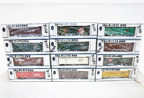 12 Crown Hi-Rail Freight Cars: Assorted styles & road names with a few custom painted examples for L&J hobbies. All appear to be unrun with graffiti on boxes, 3 have light axle oxidation, otherwise C8+. Some boxes in this lot may h