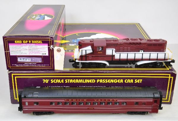 MTH Lehigh Valley Passenger Set: 042. Includes 20-2209-1 GP-9 diesel with dual motors, ProtoCouplers & ProtoSounds with squeaking brakes & freight yard sounds; 20-6527- 70 ft streamline 5-car set. Diesel shows light run time, cars ar