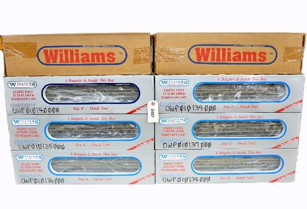 8 Pc Williams B&O Passenger Cars: 042. All are 72 ft streamline ABS cars including baggage, combine, 3 vista-domes; coach, diner & observation. All appear unrun with graffiti on boxes, C9. Some boxes in this lot may have light to mode