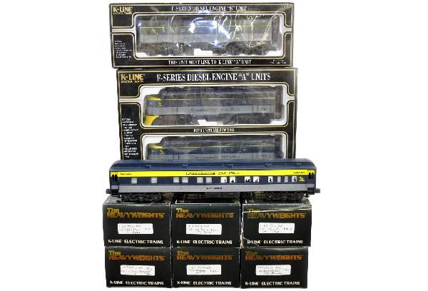 K-Line C&O Diesel Passenger Set: Includes F7 AA Diesels with dual motors, plus the powered F7 B-Unit with horn; steel side 18" Madison cars include baggage, RPO, sleeper, coach, diner & observation. All appear unrun with graffiti on 