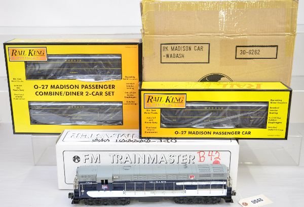 FM & MTH Wabash Diesel Passenger Set: Includes an FM SA-1006 dual motor FM diesel; MTH RailKing Madison cars 30-6262 4-car set, plus 30-6263 combine/diner set. All appear test run with boxes, C9. Boxes in this lot may have light to modera