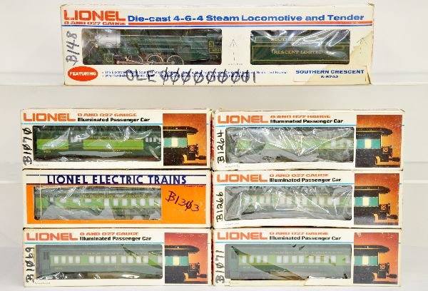 7 Pc Lionel Southern Crescent Set: Includes 8702 loco & tender; matching passenger cars- 9530 baggage; 9531 combine; 2 #9532 coaches; 12001 diner; 9534 observation. All show light run time with graffiti & staining to boxes, C8. Boxes i