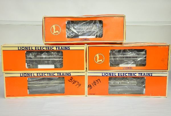 5 Lionel NYC Passenger Cars: Includes aluminum cars 19137 roomette; 19174 coach; 7207 diner; 19172 baggage; 9595 combine. All appear unrun in worn boxes, some with graffiti, C9. Boxes in this lot may have light to moderate baseme