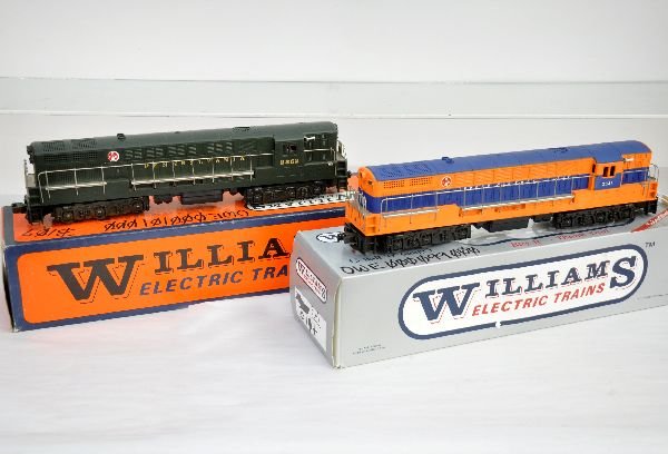 Boxed Williams JC & PRR FM Diesels: Both are dual motored and appear unrun with graffiti on boxes, C9. Boxes in this lot may have light to moderate basement smell