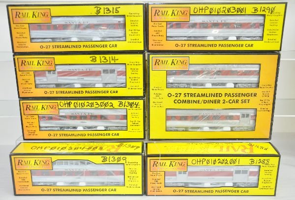 MTH RailKing SF Passenger Cars: Includes streamline cars- 2 #6010 baggage cars; 2 #6011 coaches; 6012 vista-dome; 6014 combine/ diner set; 6013 observation. All appear unrun with graffiti on boxes, C9. Boxes in this lot may have lig