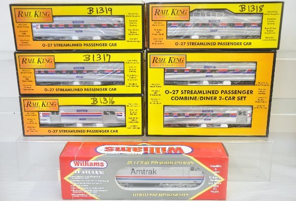 Williams MTH Amtrak Passenger Set: Williams EP-5 electric with horn; RailKing 6000, 1, 2 & 3 4-car set; 30-6004 combine/ diner set. All appear unrun with graffiti on boxes, C9. Boxes in this lot may have light to moderate basement smel