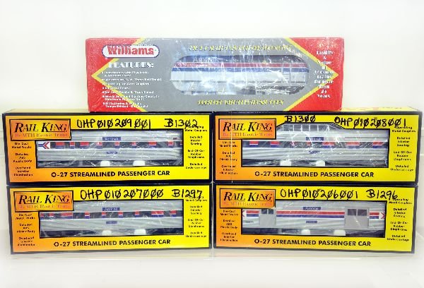 4Pc MTH/ Williams Amtrak Set: Williams GEN802 Genesis Loco with horn, factory sealed in box; MTH RailKing 6000, 1, 2 & 3 streamline cars. Cars are unrun with graffiti on boxes, C9-10. Boxes in this lot may have light to moderate b