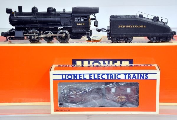 Lionel 18000 B6 Switcher & Caboose: Includes the 1st reissue of the B6 switcher with smoking stack & chests, light & back-up light, RailSounds with whistle/bell sounds; 19709 smoking work caboose, missing stack top. Both show light run 