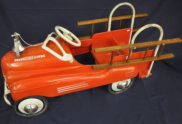 1949 Murray Fire Chief Pedal Car: Nice original finish on the body with a restored seat. There is minor staining & appears to have its original ladders and bell. It shows moderate playwear and will make a great display piece! C6