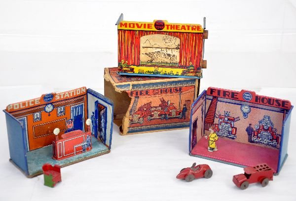 3 Marx Hometown Buildings: Includes 186 Fire House with accessories & rough original box; Police Station with accessories & Movie Theatre with north pole adventure, screen roll has some repairs. Tin shows light playwear, C7+