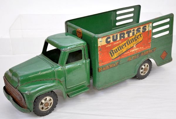 Buddy L Curtiss Candy Truck: Circa 1957. 22" painted pressed steel with Baby Ruth decals both sides. 1 side 75%, other 90%. Truck is fairly clean & shiny, grill plating is off. Over-all shows light to moderate playwear, otherwise
