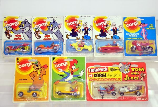 8 Corgi Jr. Comic Character Cars: Includes 3 Tom & Jerry; 2 Popeye; Yogi Bear, Woody Woodpecker & Pink Panther. All are sealed on cards, C10