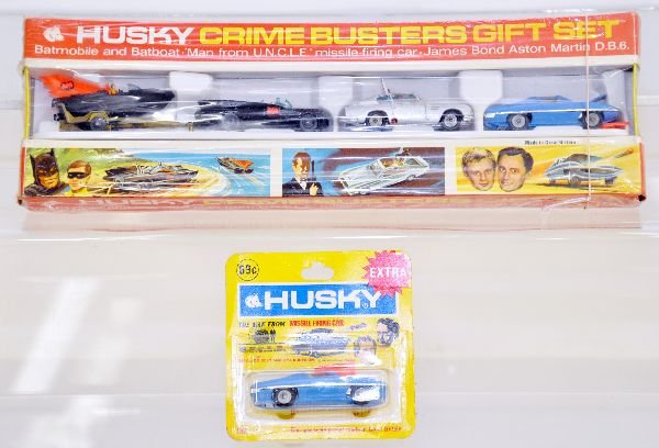 Scarce Husky Crime Busters Set, Plus: Includes the 4pc set 3008 with Batmobile hauling Bat Boat; 007 Aston Martin & Man From Uncle Missile Firing Car, plus a separate Man From Uncle car. All are factory sealed, C10
