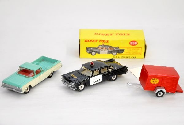 4 Vintage Dinky Vehicles: Includes 258 Dodge Royal Police, broken antenna, boxed; 449 El Camino; 258 Ford Fairlane Police, missing antenna; Acme trailer from set 448. All are fairly clean & shiny and show light playwear, other