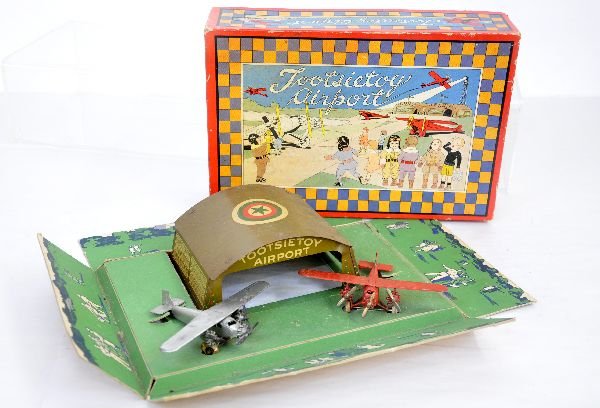 Boxed Tootsietoy Airport Set: Clean with tin hanger & 2 Tri-prop airplanes. All are intact, showing light playwear with super box & insert, C7+