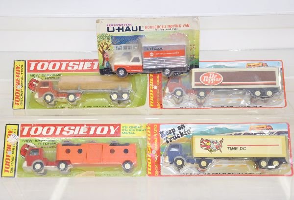 6 Mint 1970s Tootsietoy Vehicles: Includes 2990 Dr. Pepper Semi; 2990 Time DC Semi; Horse Truck, card opened; U-Haul Truck & Log Semi. Otherwise sealed on cards, C9-10