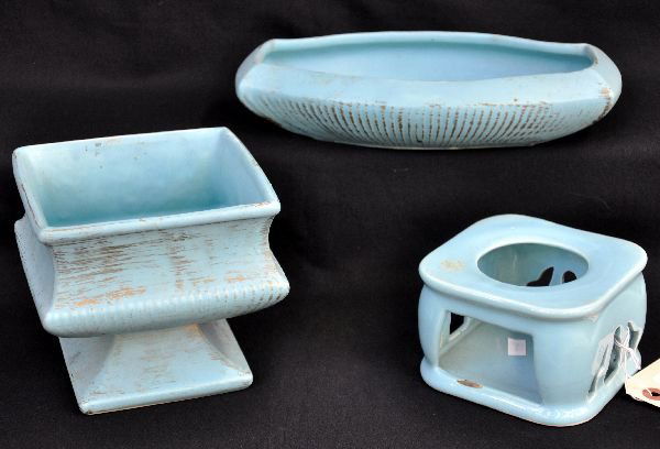 3 Pc McCoy Pottery Group: Includes a bisque 5 1/2" square planter with gold brushed pattern; 11" low bisque planter with fluted designs with gold brushed highlights & an unusual blue glaze teapot base with space for burner, bu