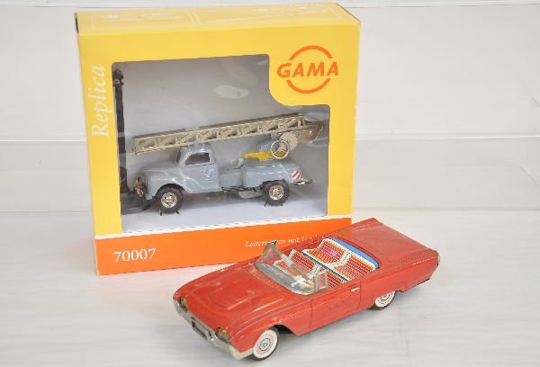 Bandai & Gamma Tin Vehicles: Boxed Gamma 70007 Electric Co ladder truck, new in box; 11" Bandai 1963 Ford Thunderbird, wind shield frame broken, but piece is included, showing light playwear, otherwise C7