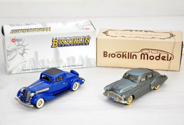 2 Boxed Brooklin Buicks 10 & 133: 1:43 Scale. 10 -1949 Roadmaster, white walls yellowed; 133 -1934 96-S Coupe. Both are otherwise like new with boxes, 1 no insert, C8-9 (Brooklins are very delicate and may have minor trim issues)