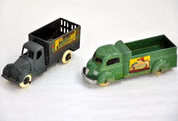 2 Tootsietoy Wrigley's Gum Trucks: Includes a medium green streamline truck, decals 94% one side, 99% the other. It has 1 repaired tire and shows light to moderate playwear, C7; Mack cab Wrigley's truck with 97% decals, but has been he