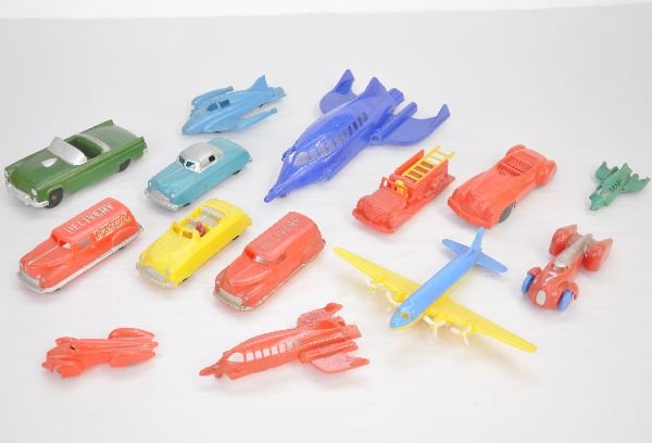 14 Piece Hard Plastic Vehicle Lot: Includes 8 Renwal vehicles and 6 additional pieces, largest is 9 1/2" Rocket ship. All appear intact and show light playwear, C8
