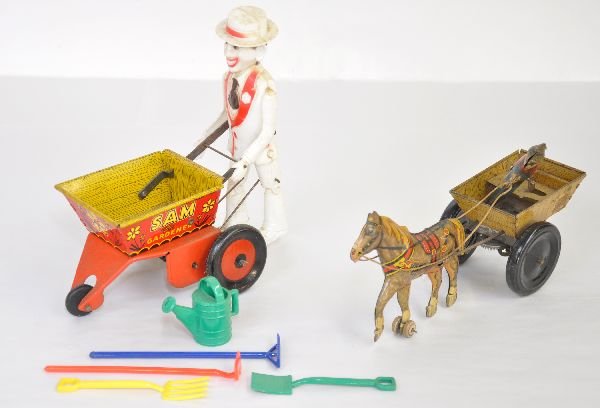 2 Marx Windup Toys: Includes Sam the Gardener with all 4 plastic tools & water can, mechanism functions and will clean to C7+; Baulky mule, mechanism functions, but 1 wheel is loose & 1 driver support is incomplete, show
