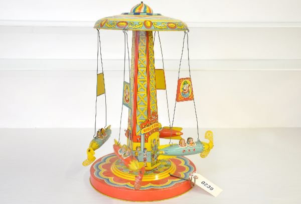 Large Chein Rocket Ride: Litho Tin, 19" tall. Mechanism functions. Plastic propellers are worn & incomplete, but tin is clean & shiny, showing light playwear, otherwise C8