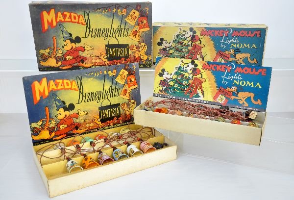 2 Boxed Sets of Disney Christmas Lights: Includes The Scarce Fantasia DC Current, British Thomson-Houston Mazda Lamp set from England & the Noma version. Both are working and have their display boxes. They should clean to C7+-8