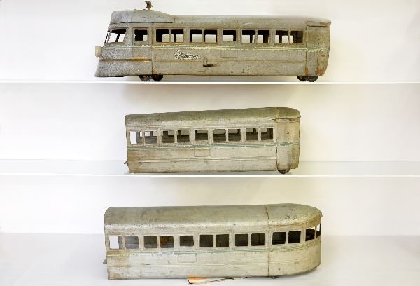 Rare Buddy L Burlington Zephyr Floor Toy: Circa 1935, 3 pc pressed steel ride on train. Over-all length about 66". It has all its original decals though worn, 1 is lifting in front. It is very dirty, but will clean up as we did a small sectio