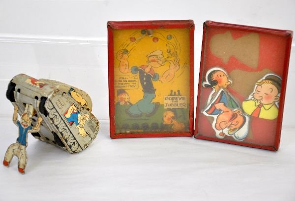 3 Vintage Popeye Toys: Includes 2 early 5" palm puzzles with glass covers, 1 chipped, otherwise C8; Marx Pop-up roll-over tank, litho tin, mechanism functions, C5