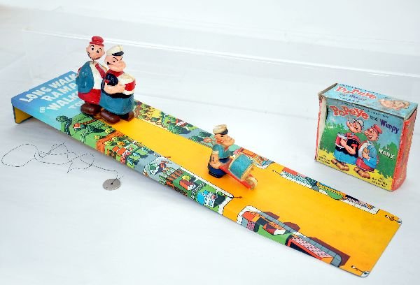 Marx Popeye Ramp Walkers with Ramp: Includes large size Popeye with Wimpy. Original string & weight with worn box; regular size Popeye with barrow, plus a scarce tin litho ramp. All show light playwear, C7-7+