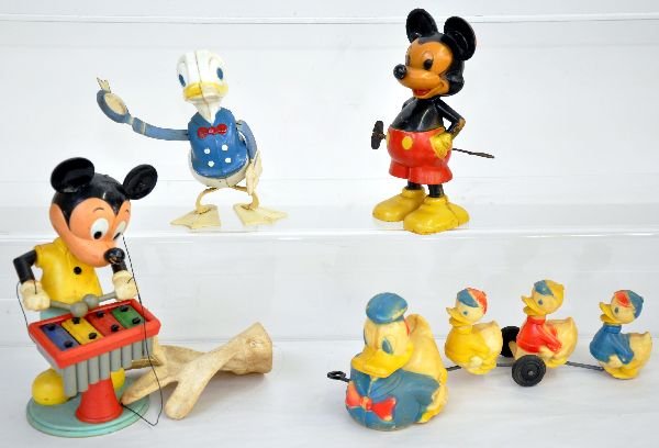 5 Vintage Plastic Disney Toys: Includes Konner Marionette Mickey Zylotone; Marx Donald with metal arms, holdback not working; Whirltail Mickey Mouse; Donald with kids, otherwise all mechanisms function and show light to moderate pl