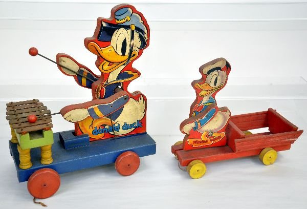 2 Fisher Price Donald Duck Toys: Includes the 185 black labeled large Donald Duck Zylotone & 400-500 Donald Duck cart. Both show light to moderate playwear and should clean to C7-7+