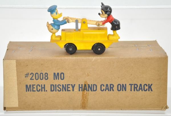 Boxed Marx 2008 Mickey & Donald Hand Car Set: Includes a plastic handcar, mechanism functions with a circle of O gauge track. The plastic has darkened somewhat on side, but only shows light playwear with scarce set box, C7+ ish