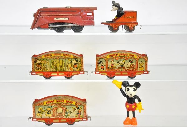 Lionel Mickey Mouse Circus Set: Includes a 1511 streamline locomotive with whistle, mechanism functions, but weak, no whistle sound; 1506M stoker tender, figure touched up & flaking; 1518 Mickey Mouse Diner, 1519 Mickey Mouse Band &