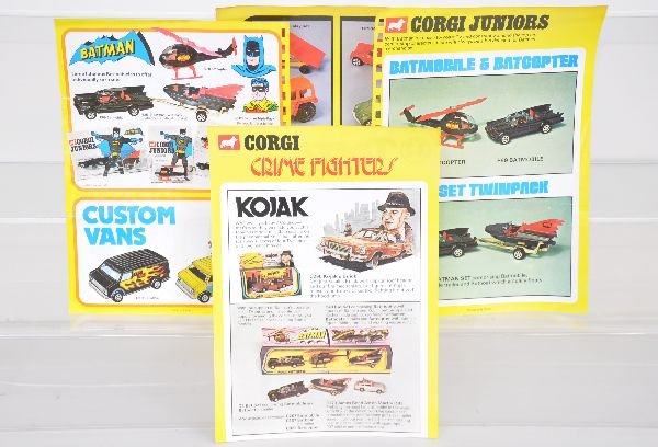 4 Small Dealer Posters: All 8 1/2X11" color two sided posters, early 1970s showing Batman, 007 & other character toys. All clean
