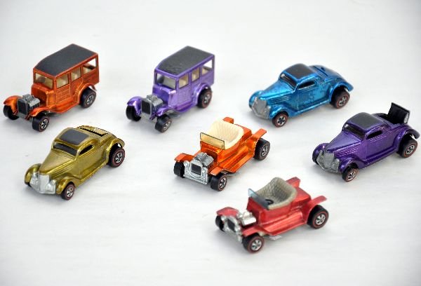 7 Mattel Hotwheels Redline Vehicles: All clean including 2 different 31 Ford Woodys; 3 different 36 Ford coupes with rumble seats; 2 different Hot Heaps. All show light playwear, C7+
